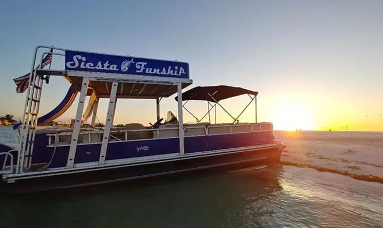 Enjoying sunset boat tours over calm coastal waters at dusk